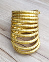 Beautiful spiral gold Tone Bangle set