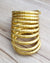 Beautiful spiral gold Tone Bangle set