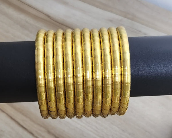 Beautiful spiral gold Tone Bangle set